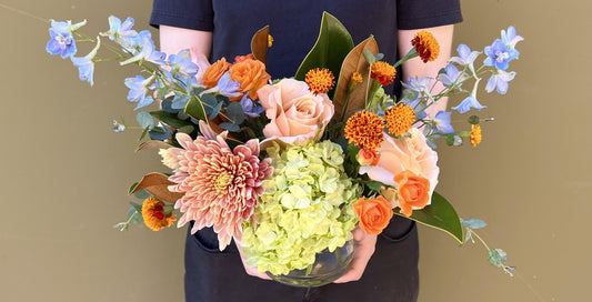 Thankfully Yours | Magnolia, Delphinium, French Marigolds - The English Garden