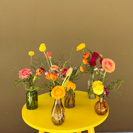 Colorful Flowers in Bud Vases